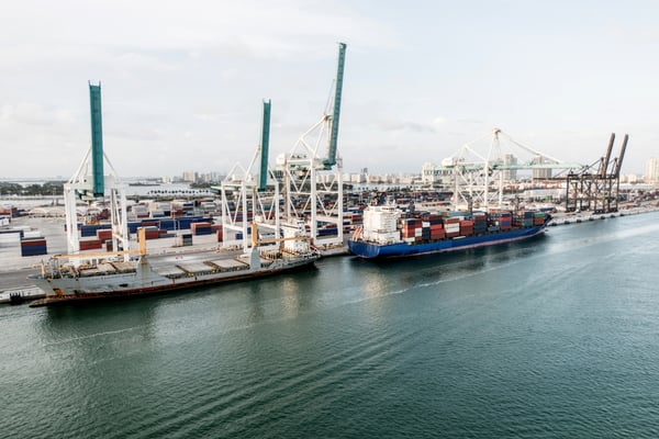 Trade boat arriving, at the port with merchandise